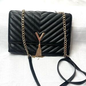 Woman’s black purse